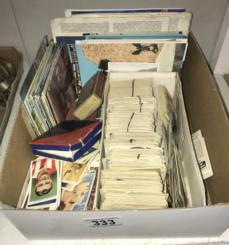 A box of teacards and postcards