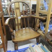 A Victorian child's Windsor chair.