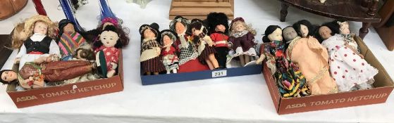 3 boxes of costume dolls