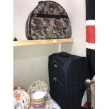 A travel bag and suitcase