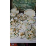 Approximately 40 pieces of Burleigh Meadowland pattern tea and dinner ware.