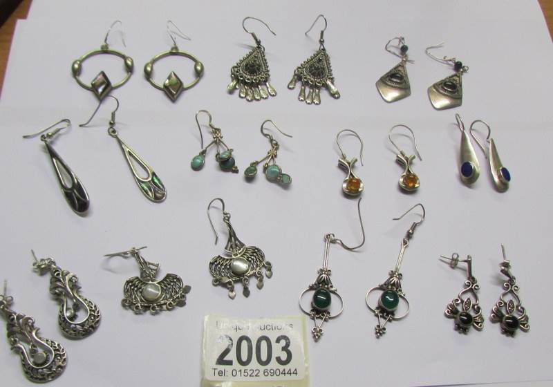 Approximately 10 pairs of fashion earrings including some silver.