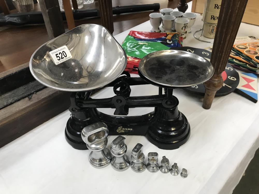 A cast iron set of kitchen scales