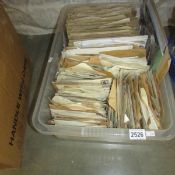 A large quantity of envelopes containing GB and world stamps.