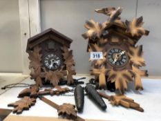 2 cuckoo clocks (1 missing weights)