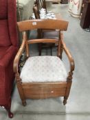 A 1930's mahogany commode / carver chair
