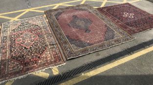 3 rugs - Red/white/blue pattern rub 75" x 59", red/beige oriental style rug 96" x 53.