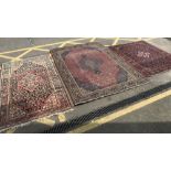 3 rugs - Red/white/blue pattern rub 75" x 59", red/beige oriental style rug 96" x 53.