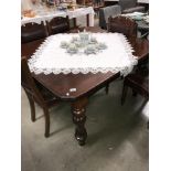 A Victorian mahogany dining table