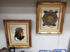 A pair of gilt framed Egyptian paintings on papyrus