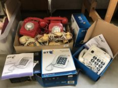 A quantity of boxed and unboxed telephones