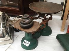 A set of cast iron scales and weights