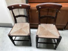 2 spindle wing backed chairs with woven string seats