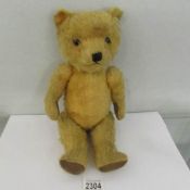 A vintage teddy bear.