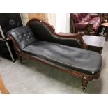 An Edwardian mahogany chaise longue