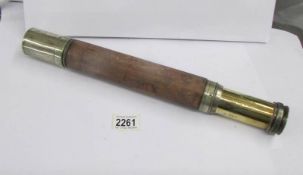A mid 20th century brass and leather telescope marked W. Ottway & Co., Ltd.
