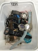 A quantity of wrist watches including Swatch and Ben Sherman