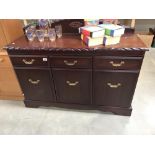 A mahogany effect sideboard