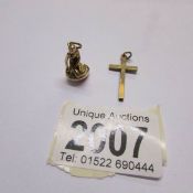 A gold little mermaid pendant marked 585 Denmark and a 9ct gold cross pendant,