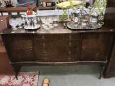 A vintage strongbow furniture darkwood stained sideboard