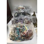 4 sealed bags of costume jewellery