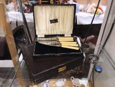 2 1930's cased cutlery sets,
