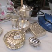 A mixed lot of silver plate including tea set.