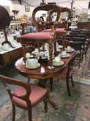 A reproduction mahogany dining table and 6 balloon back dining chairs