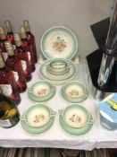 A Susie Cooper dinnerware including soup bowls and plates