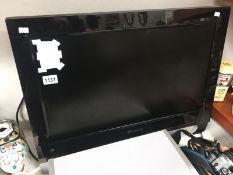 A Polaroid flat screen TV with wall mount
