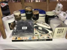 A quantity of Guinness advertising items