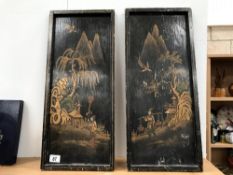 A pair of lacquered panels