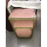 A 1930's pink loom bedside cabinet with glass top