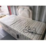 A single mattress and electric bed base with matching head board