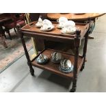 A pine tea trolley with butlers tray