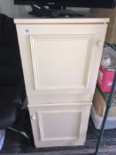 A pair of matching bedside cabinets