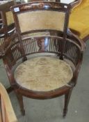 A Victorian mahogany inlaid chair.