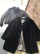 A ladies sheepskin jacket and a short ladies fur coat
