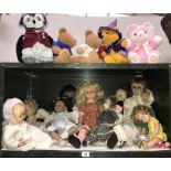 2 shelves of dolls including porcelain head and bears