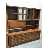 A long display cabinet with drawers (moulding A/F and glass doors missing)