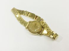 An 18ct gold ladies Omega wrist watch on 18ct gold bracelet, approximately 37 grams,