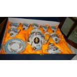 A boxed hand painted Dutch fine porcelain tea set, (box distressed).