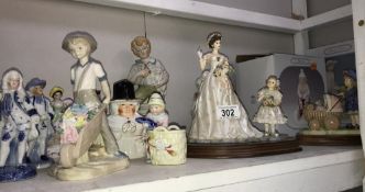 A quantity of continental and Staffordshire pottery figures etc.