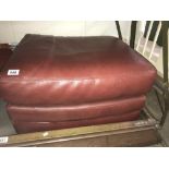 A large leather pouffe