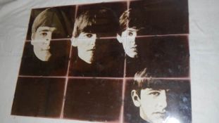 A Beatles picture in 9 parts and other Beatles items.