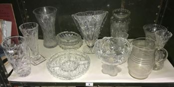 A large quantity of cut glass vases etc.