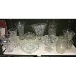 A large quantity of cut glass vases etc.