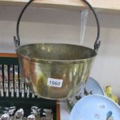 A large brass jam pan.