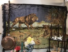 A large fabric wall hanging of Lions