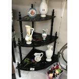 A set of oriental lacquered corner shelves